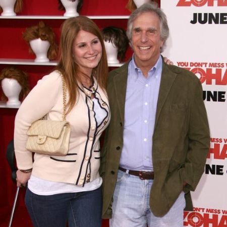 Zoe Emily Winkler and her father Henry Winkler photographed on a red carpet.